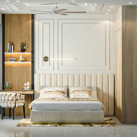 Cream channel-tufted headboard wall framed by white moulded panels with a slim linear light across the centre