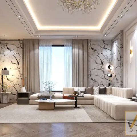 Cream channel-tufted L-sofa in a drawing room clad in purple-veined white marble, under a gold-branch crystal chandelier in a cove-lit tray ceiling