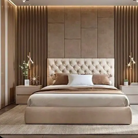 Cream diamond-tufted headboard under a beige suede panel wall laid in offset rectangles