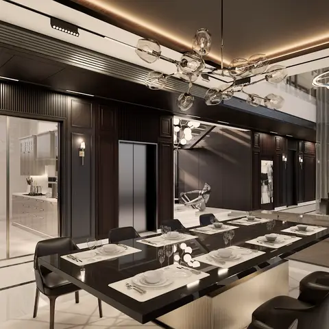 Dining area in an open-plan luxury villa with a long black stone table set for ten under a multi-globe chandelier, dark wood wall panelling