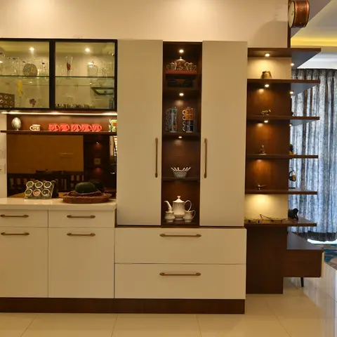 Dining room crockery unit with glass-front upper cabinets, backlit open display shelving and white lacquer drawers