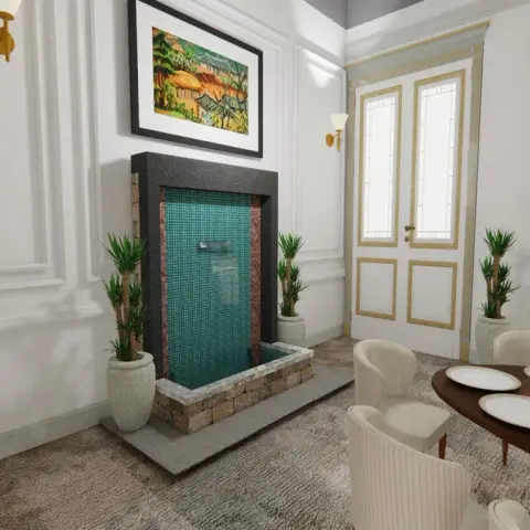 Dining room render with a tiled indoor water feature wall, classic panel mouldings, framed landscape art, and an oval wood dining table with cream chairs.