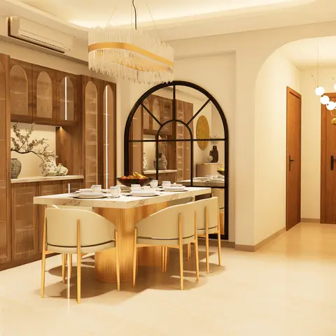 Dining room with a floor-to-ceiling fluted-glass crockery unit with arched jaali detailing, a gold-fluted marble dining table and an arched black-framed mirror.