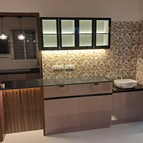 Dining-side wash counter in high-gloss mocha with a black granite top and square vessel basin
