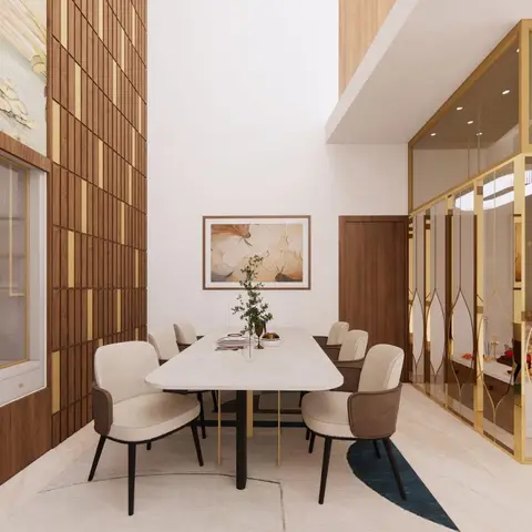 Double-height dining room with a built-in glass-front crockery unit, gold-and-wood fluted wall panelling