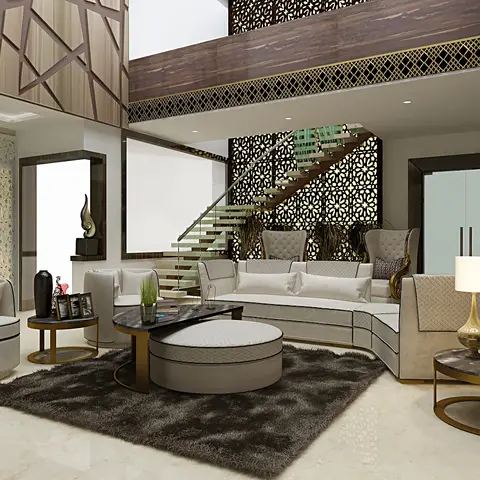 Double-height living room with a floating staircase set against a backlit laser-cut jaali screen wall