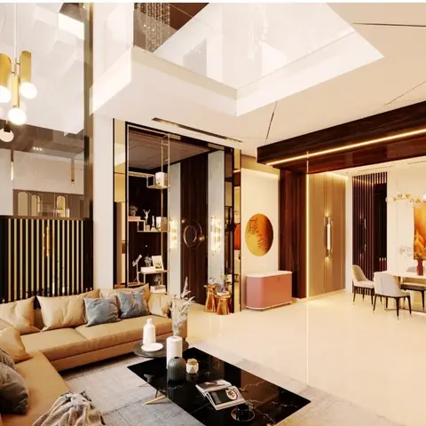 Double-height open-plan living and dining area with a mirrored void, dark wood-panelled entry corridor and a beige sectional sofa facing a black stone coffee