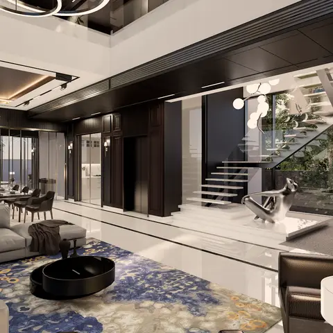 Double-height open-plan villa space showing a grey sectional living room, a formal dining table, and a floating staircase with a water feature, all in one view.