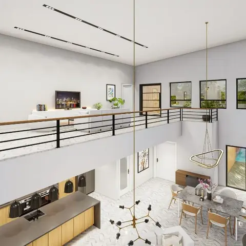 Double-height rendered interior showing a ground-floor kitchen and dining area with an open living lounge visible on the mezzanine above