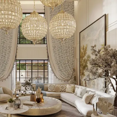 Double-height sitting room with five brass-caged crystal globe chandeliers hung at staggered drops over a curved cream boucle sofa and a round fanned-timber