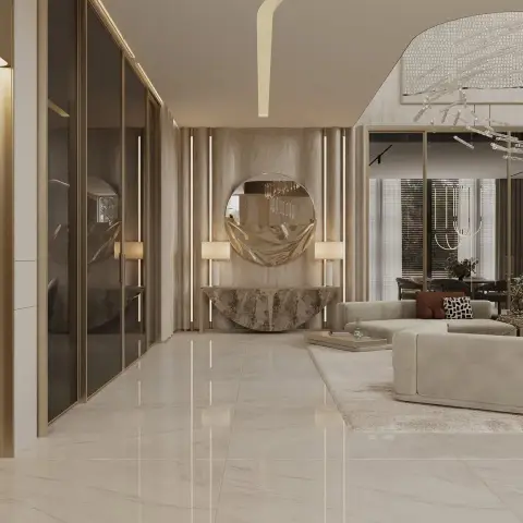 Entrance foyer with a round mirror and sculptural console table against fluted wood panelling