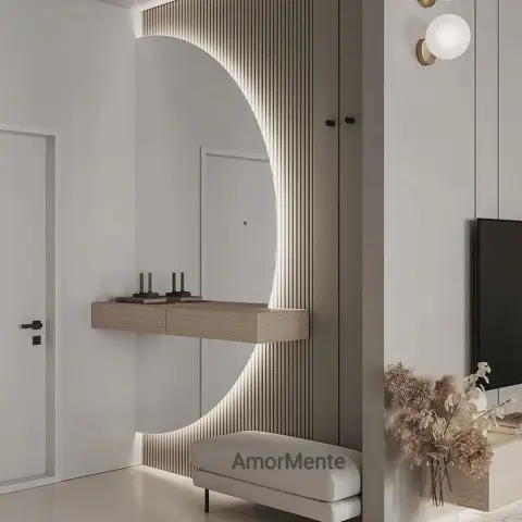 Entry foyer where a tall arched mirror is cut into a floor-to-ceiling oak fluted panel with LED washing its curved edge