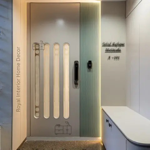 Flat entrance with a grey main door carved with four backlit capsule flutes and a digital lock, a sage fine-fluted panel with concealed cove light beside it