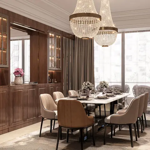 Formal dining room with an 8-seat marble-top table under two large crystal chandeliers