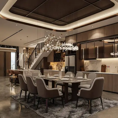 Formal dining table set for eight under a sculptural branching chandelier, with an open kitchen and staircase in the background