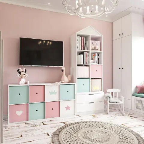 Girl's bedroom with pink walls, a pastel cubby storage unit with heart and star icons, and a whimsical bird chandelier.
