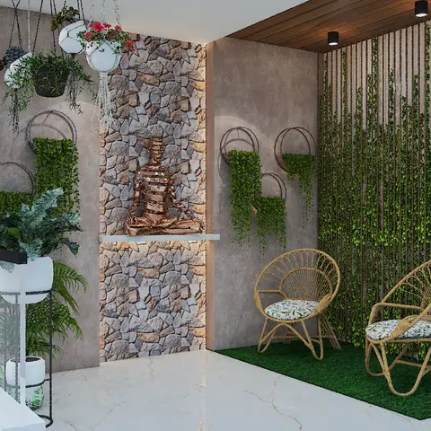 Green balcony corner with a natural-stone-clad feature wall holding a meditating Buddha statue, hanging planters on arched wall brackets