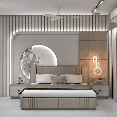 Greige upholstered bed with brass inlay lines set against a curved backlit arch holding a white 3D leaf relief, with fluted panelling wrapping the whole wall