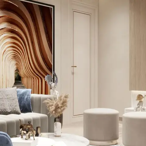 Grey channel-tufted sofa with rust and slate cushions beside a floor-height framed print of a receding arched colonnade