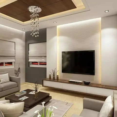 Grey-upholstered living room where a bubble-glass cluster pendant drops from a walnut-inlay ceiling raft