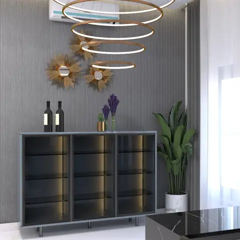 Grey wallpapered living room wall with a glass-front backlit crockery cabinet, twin gold sunburst mirrors and a tiered gold ring pendant light above