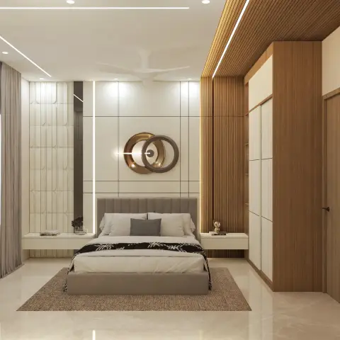 Grid-grooved ivory headboard wall carrying a brass-and-bronze double-ring sculpture