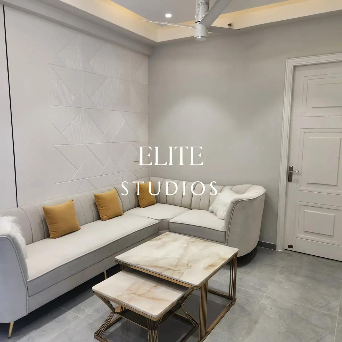 black and white modern indian living room with panelling — real Indian home