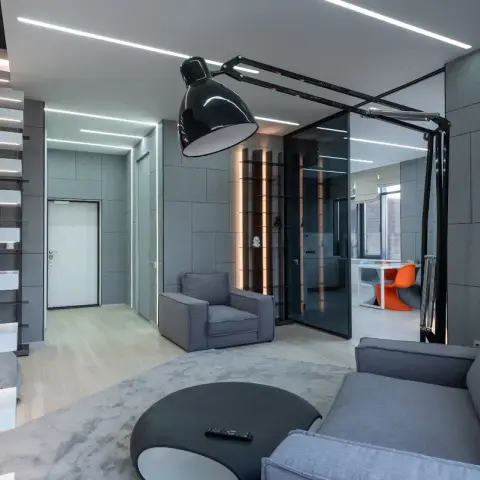 grey industrial living room with seating — real Indian home