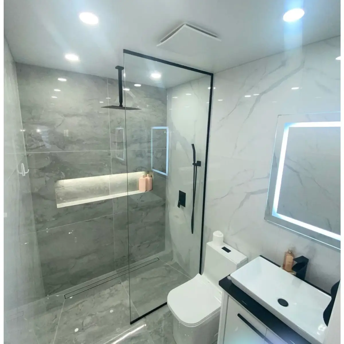 grey modern minimalist bathroom with tiles — real Indian home