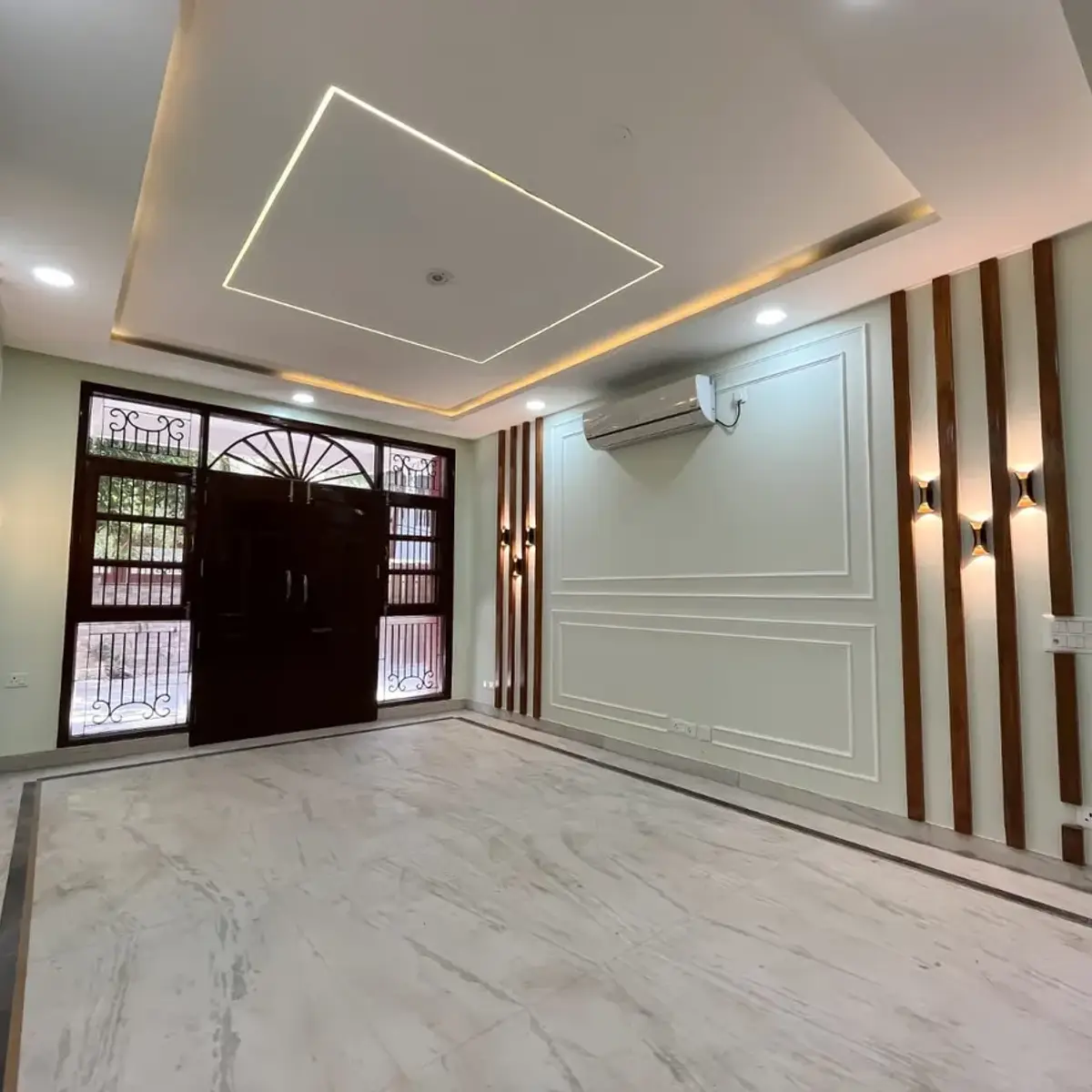 beige traditional entrance foyer with cove — real Indian home