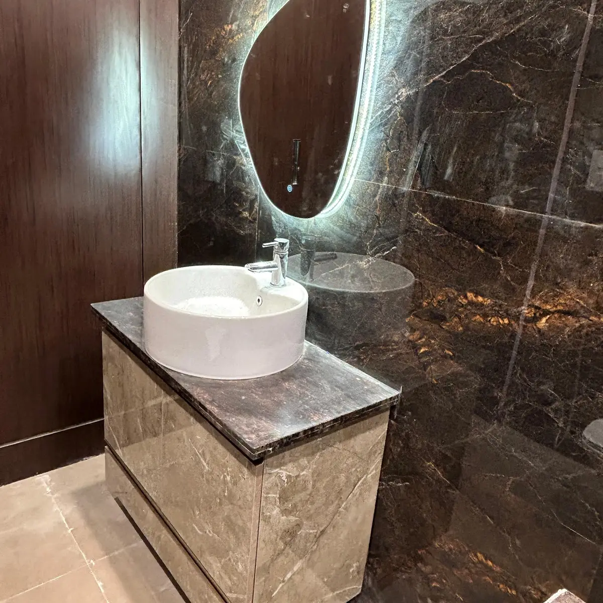 earthy luxury bathroom with cladding — real Indian home