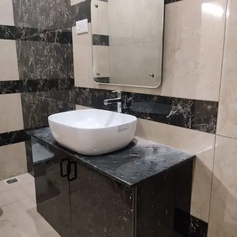 black and white modern indian bathroom with vanity — real Indian home