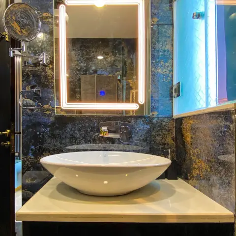 jewel tone luxury bathroom with vanity — real Indian home