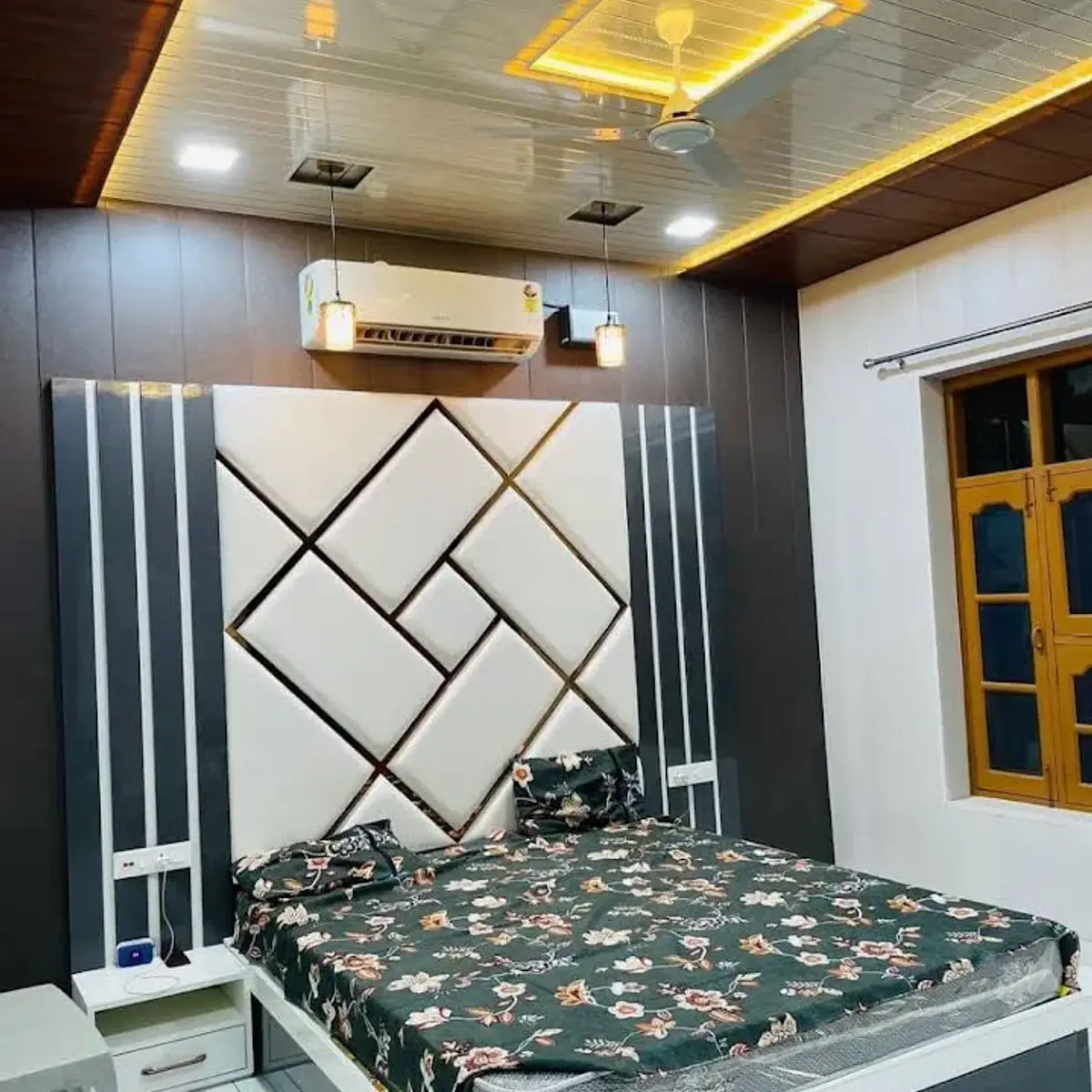 black and white master bedroom with panelling — real Indian home