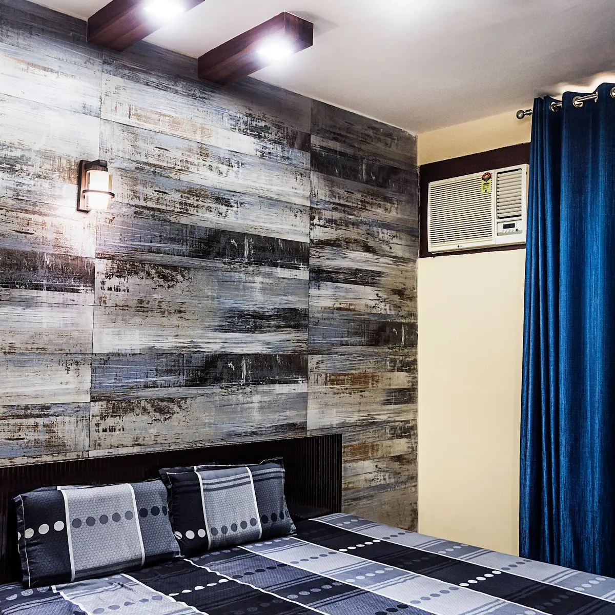 grey industrial master bedroom with cladding — real Indian home