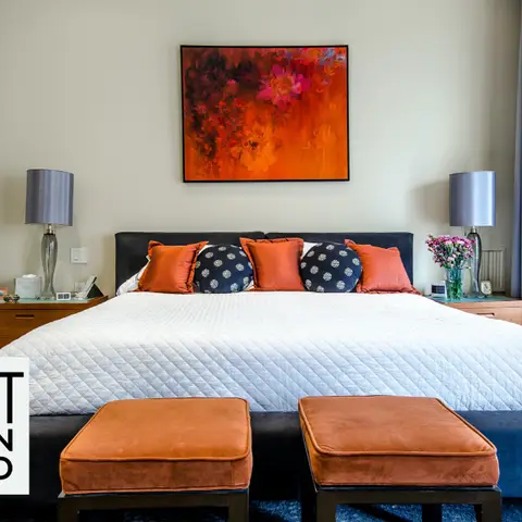 jewel tone traditional master bedroom with wall art — real Indian home