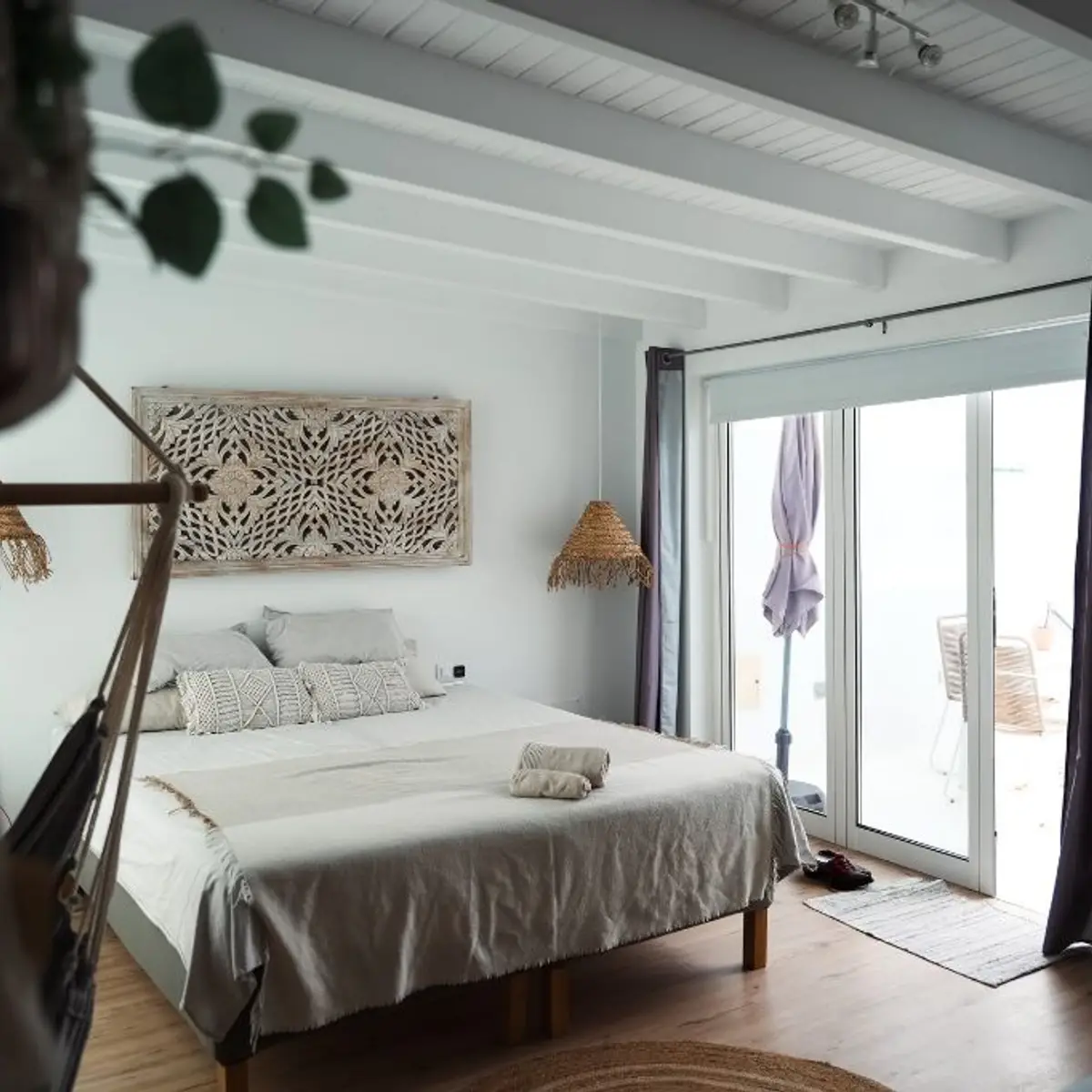 beige boho master bedroom with wood — real Indian home