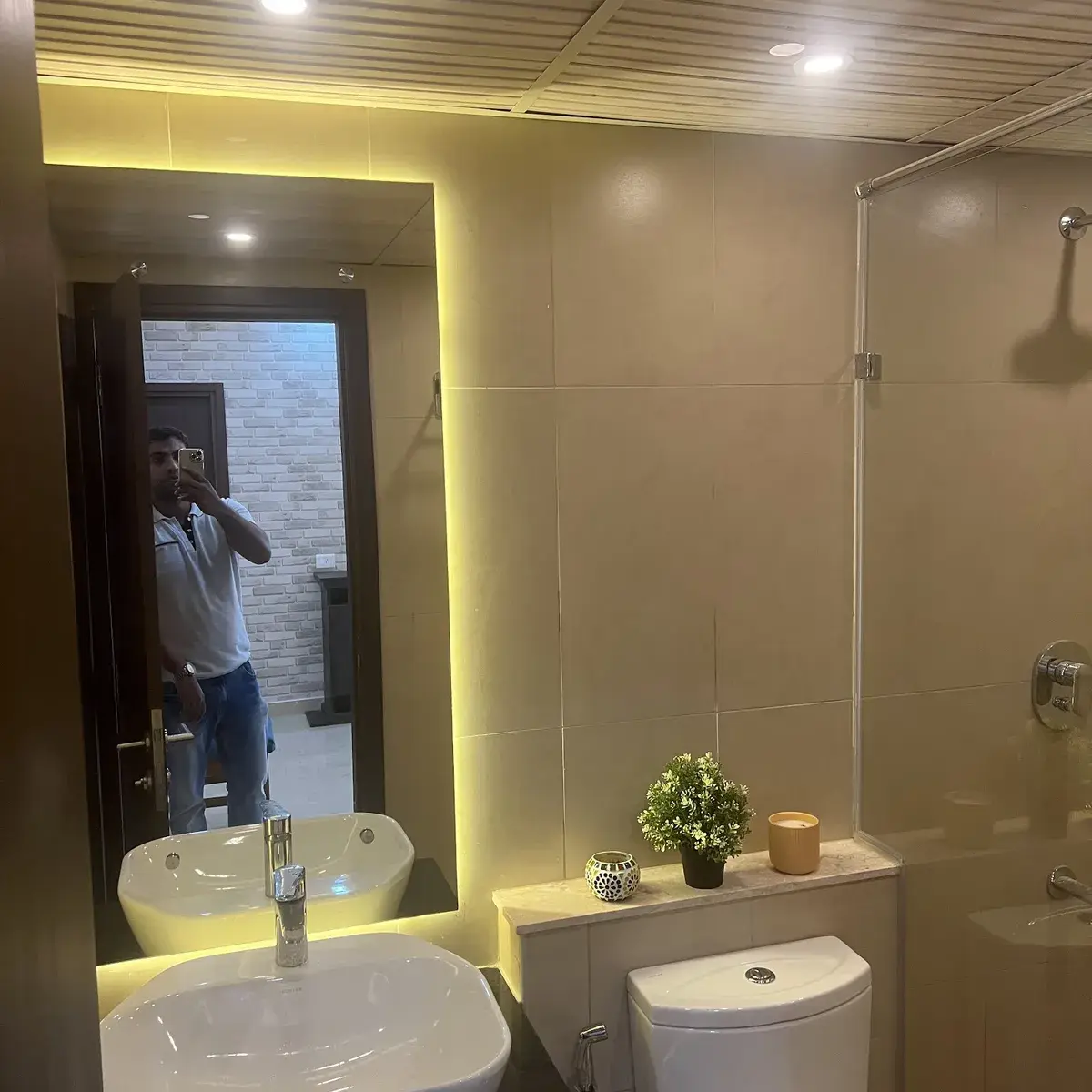 beige modern indian bathroom with vanity — real Indian home