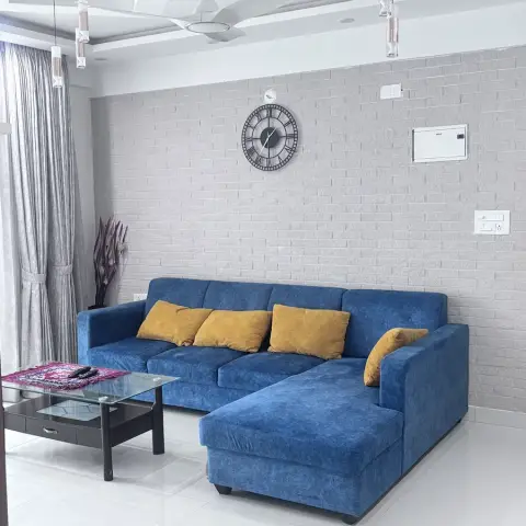 bold colour living room with seating — real Indian home