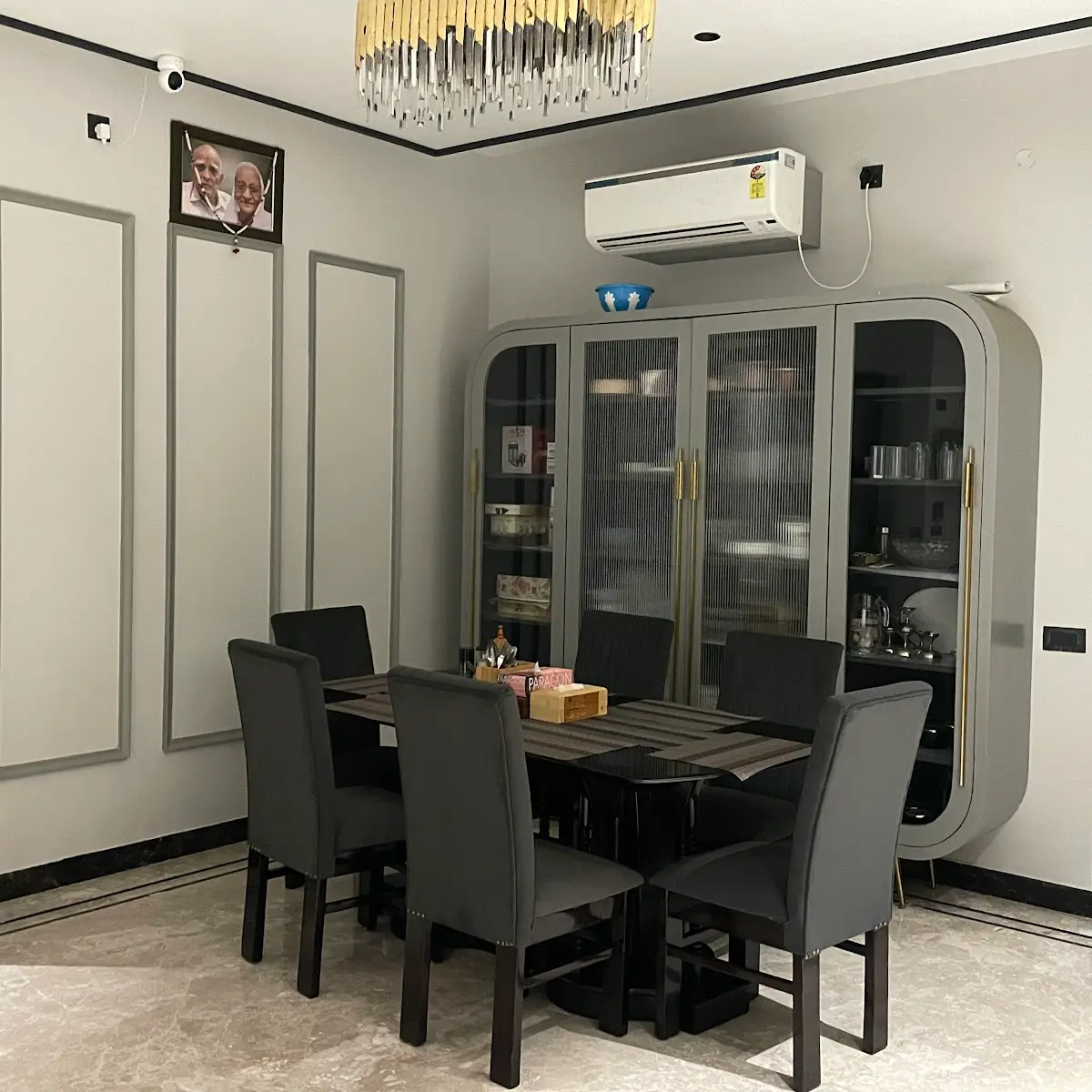 grey modern minimalist dining room with moulding — real Indian home