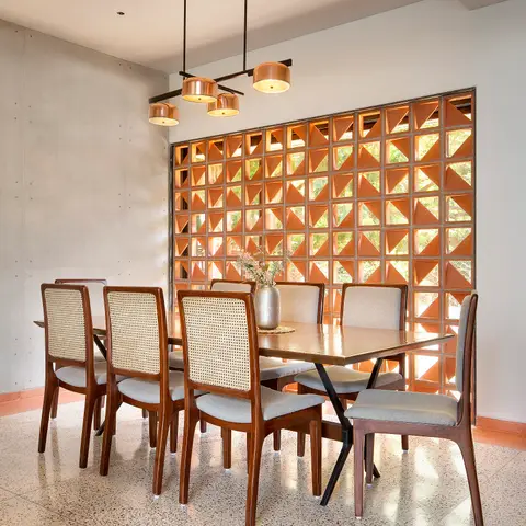 beige mid century dining room with jaali — real Indian home