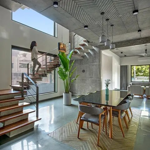 grey industrial dining room with pattern — real Indian home