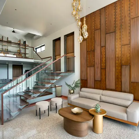 beige mid century living room with panelling — real Indian home