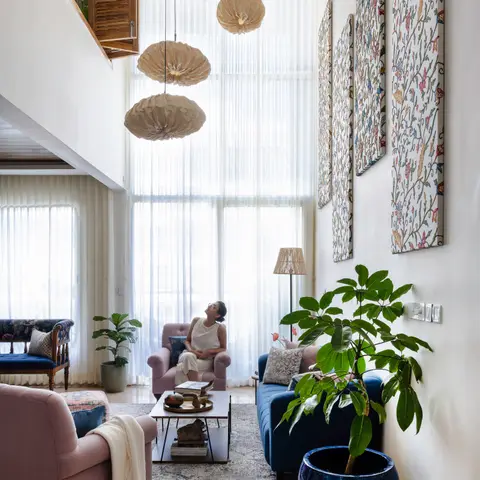 jewel tone boho living room with curtains — real Indian home