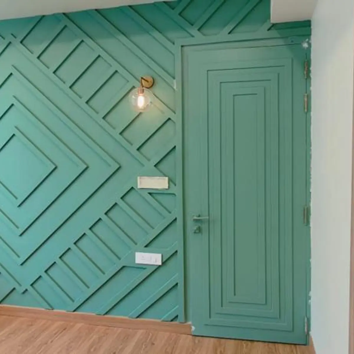 jewel tone luxury entrance foyer with moulding — real Indian home