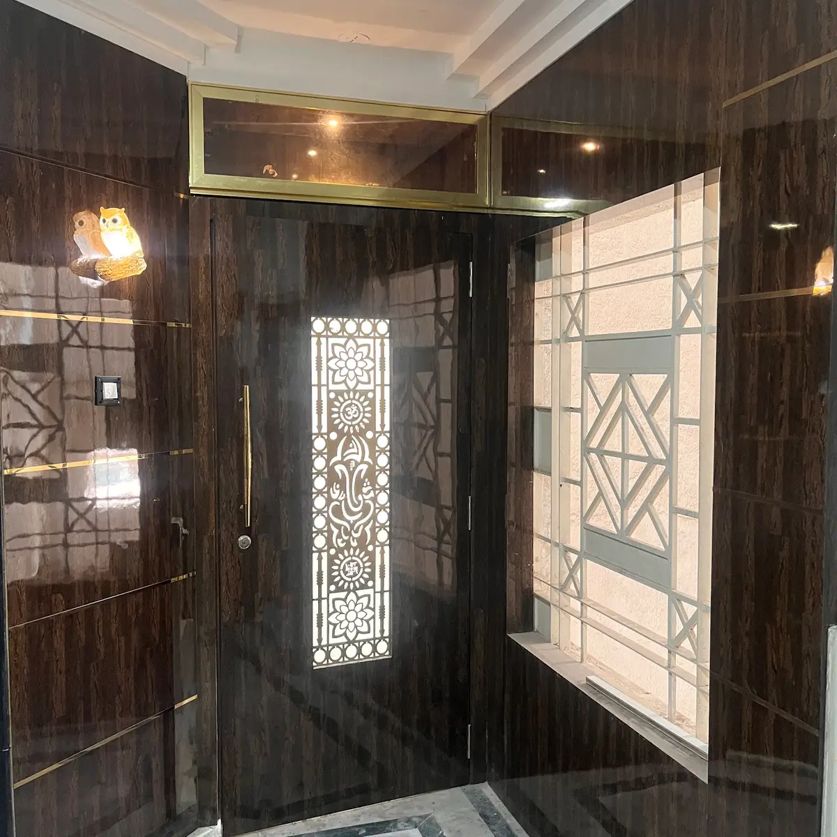 earthy traditional entrance foyer with main — real Indian home