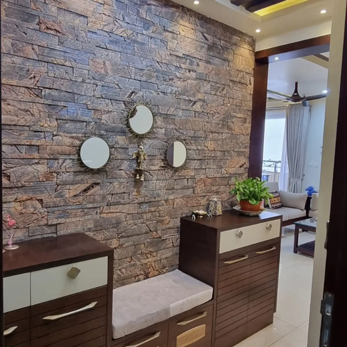 earthy modern indian entrance foyer with cladding — real Indian home