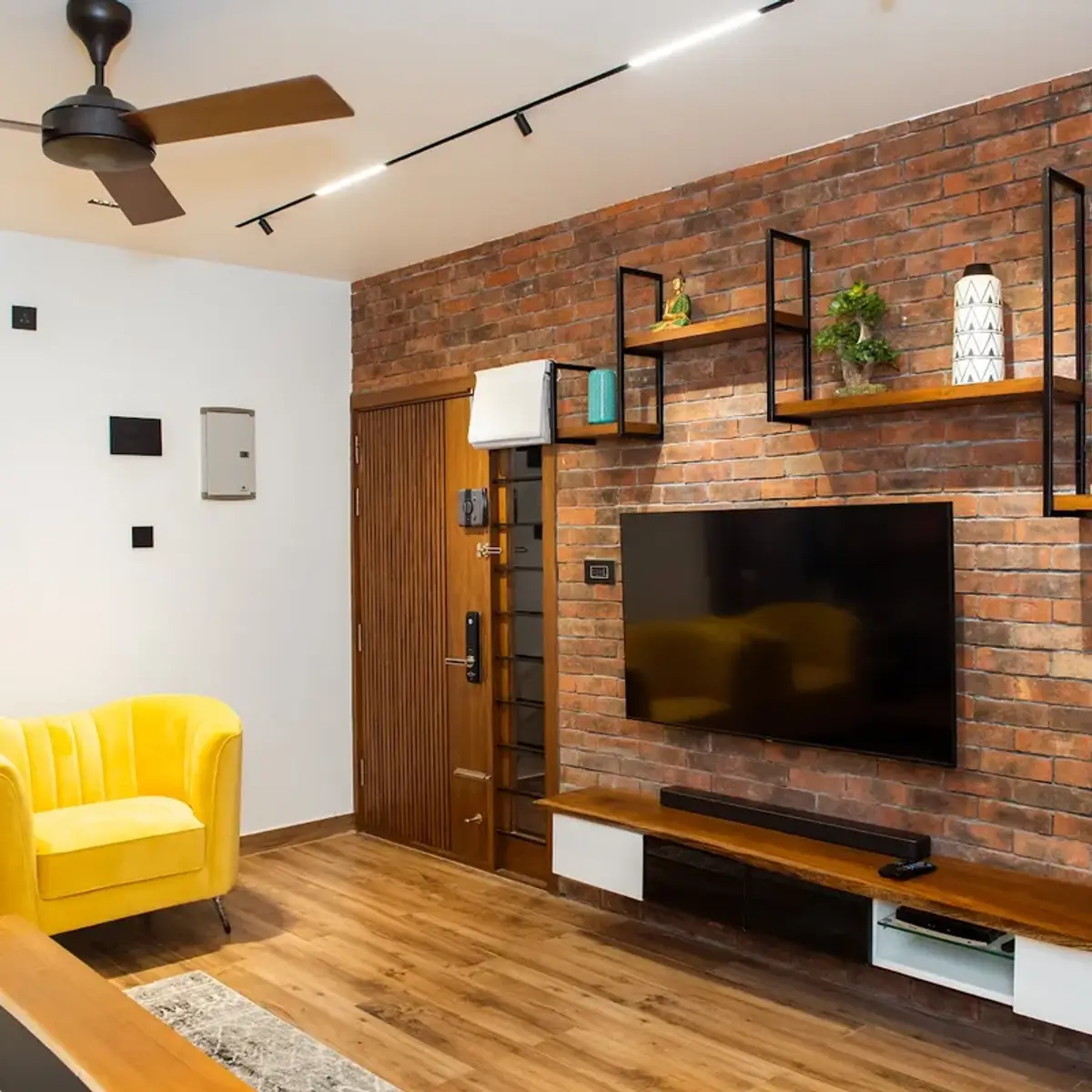earthy industrial living room with cladding — real Indian home