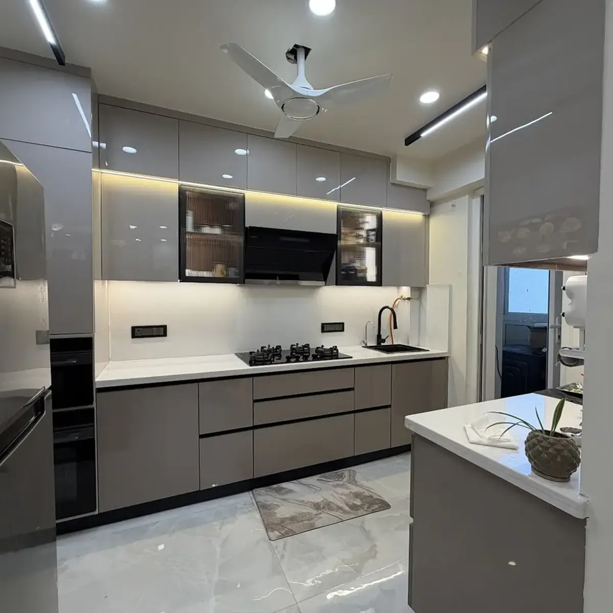 grey modern minimalist kitchen with shutter — real Indian home
