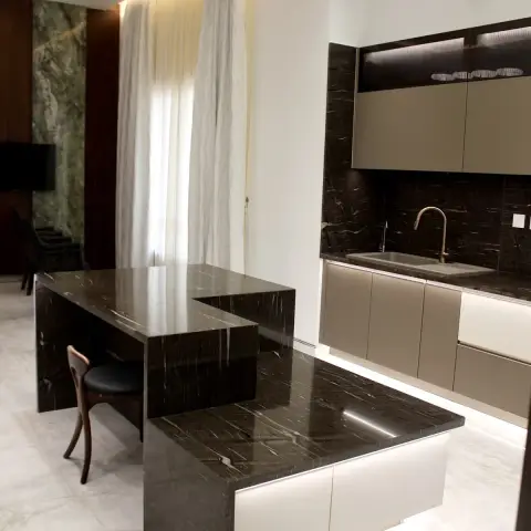 black and white luxury kitchen with counter — real Indian home